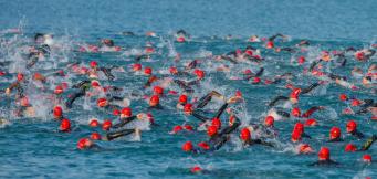 Triathlon starts with open water swimming