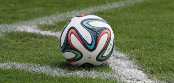 Football at corner flag