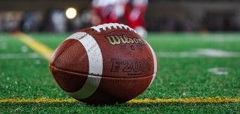 NFL quarterback waits for ball to be spiked