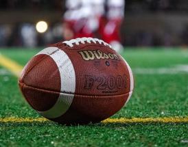 NFL quarterback waits for ball to be spiked