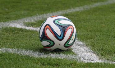 Football at corner flag