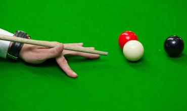Snooker Player taking shot